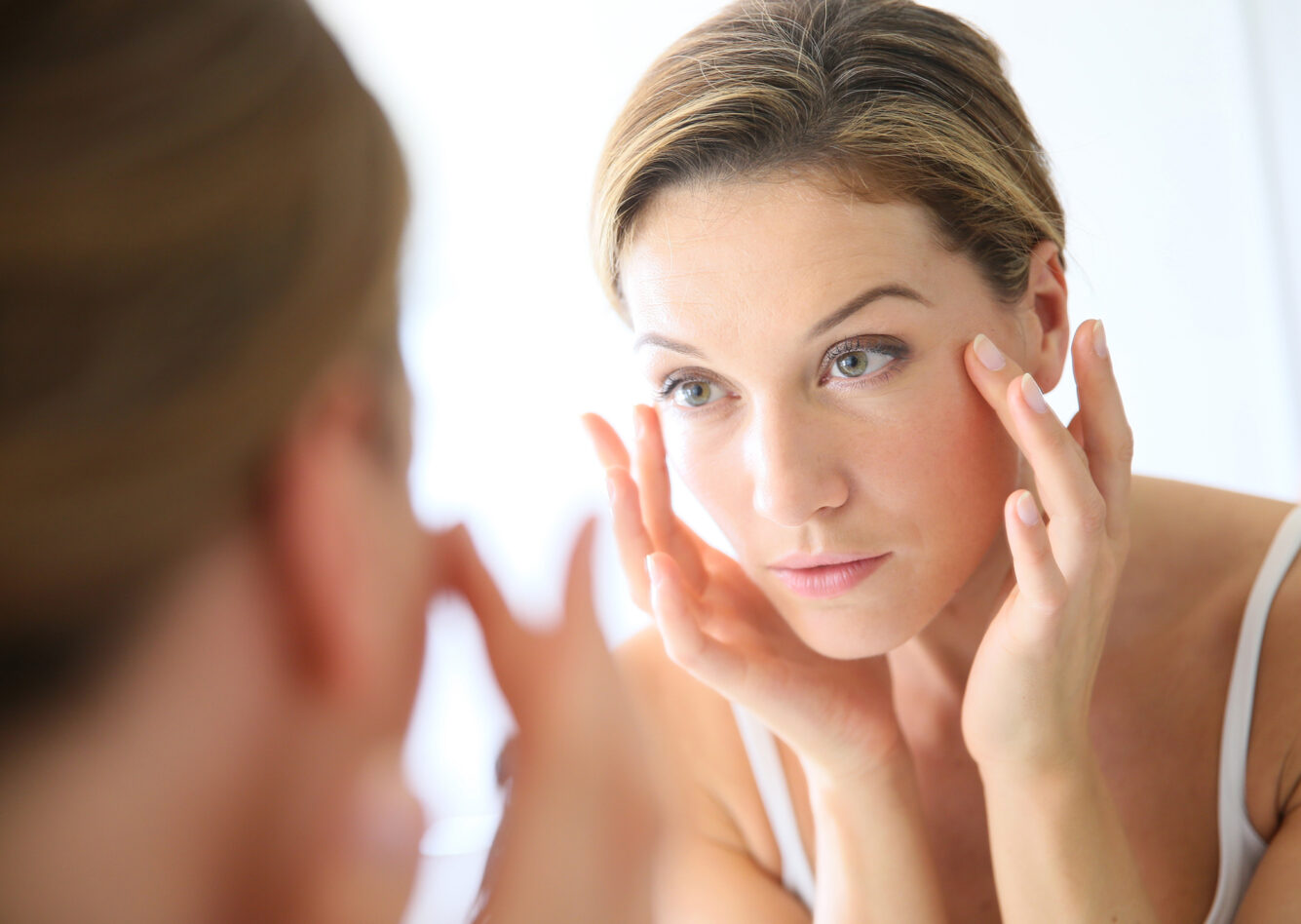 Woman Looking Into Mirror 2